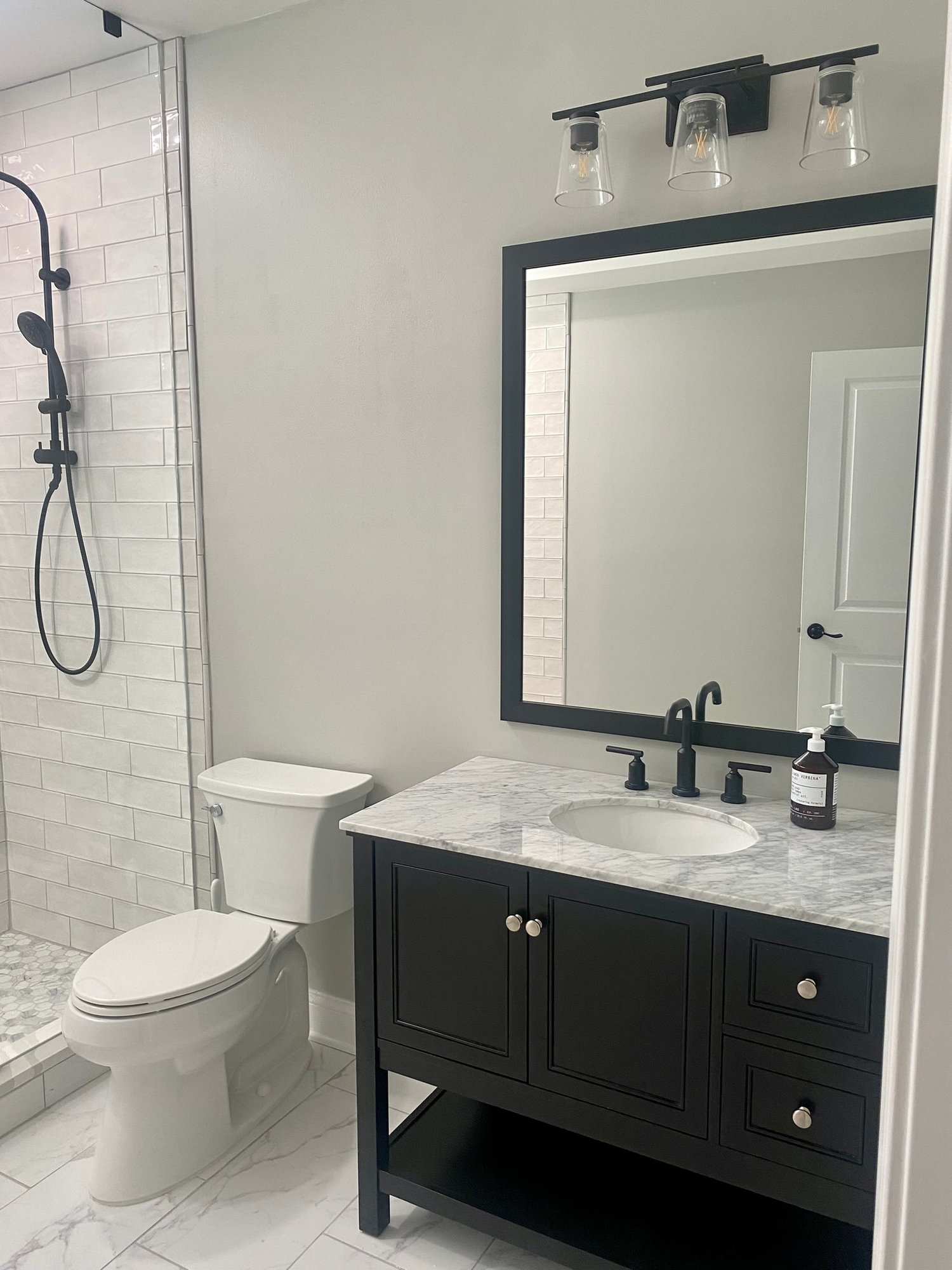 Stafford-hall-bathroom-renovation-walk-in-shower-black-vanity