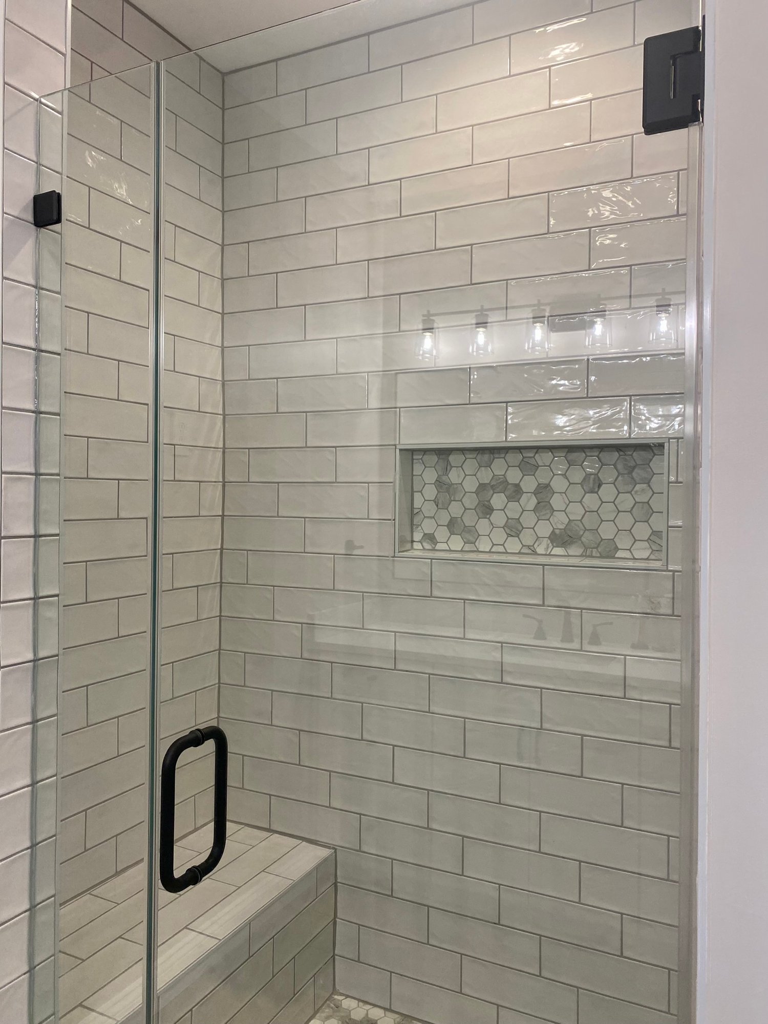 Virginia-bathroom-remodel-shower-tile-subway-texture-frameless-shower-door
